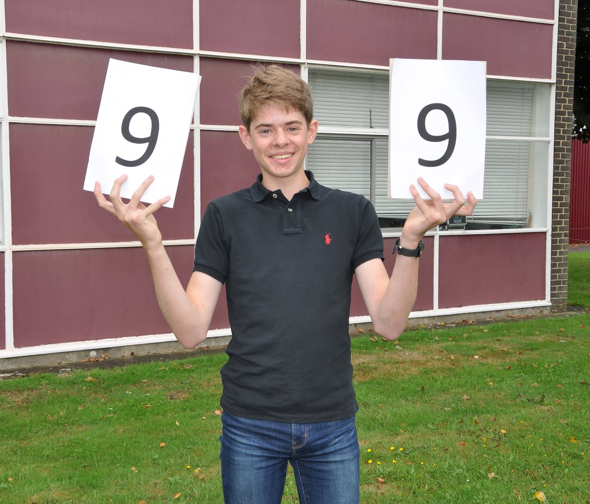 Joe Constable celebrating eight grade 9s and an A in extra maths